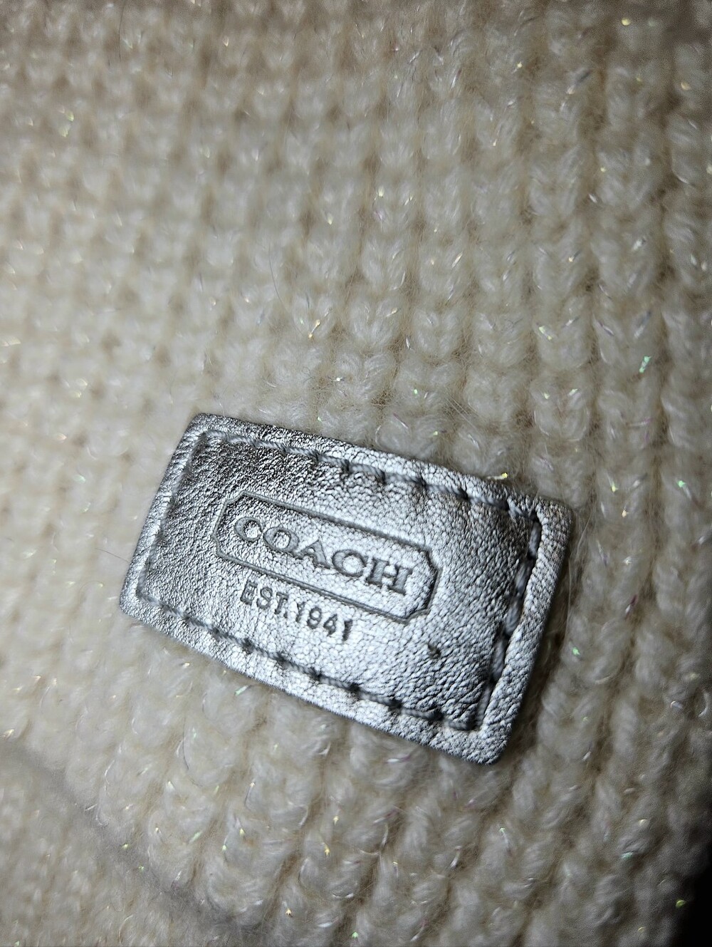 Coach Metallic Silver Logo Patch Knit Scarf in Cream